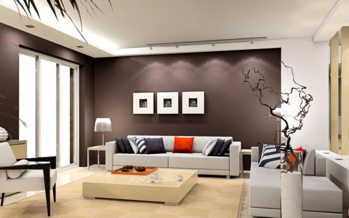 einrichtungsideen wohnzimmer braune wände beige sofas minimalistischer couchtisch