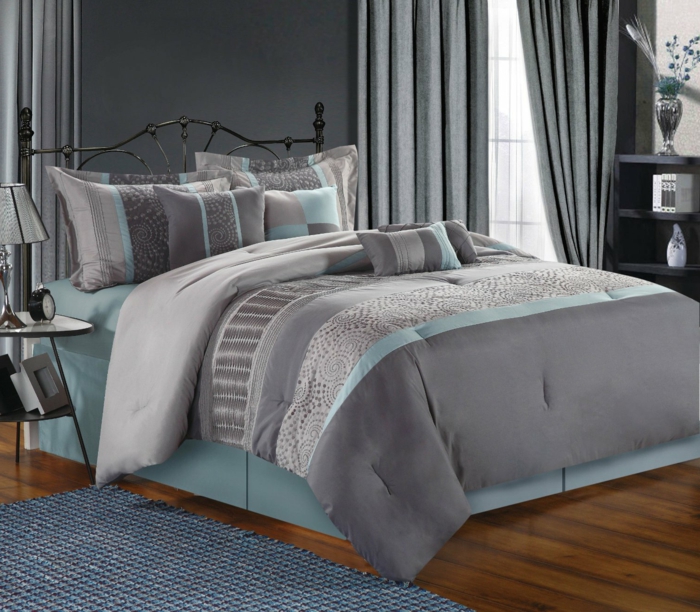 schlafzimmer grau wände hellblaues bett luxuriöse bettwäsche