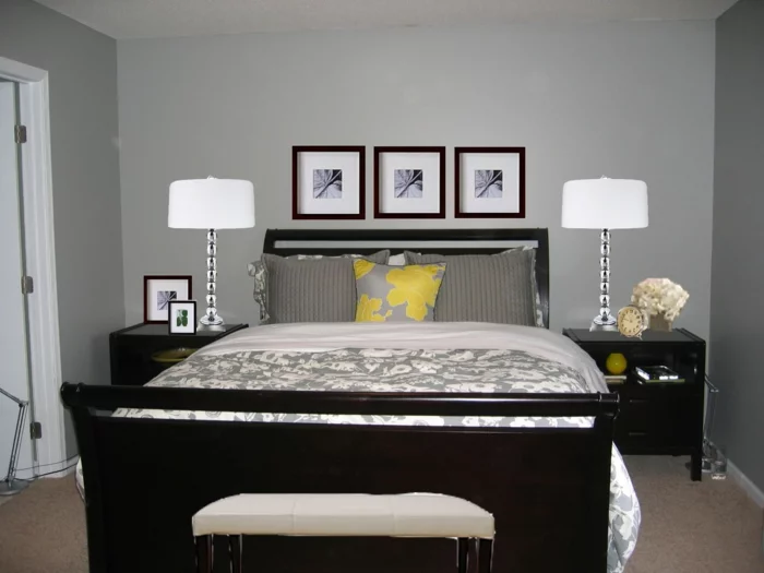 schlafzimmer grau wände teppichboden dunkle möbel