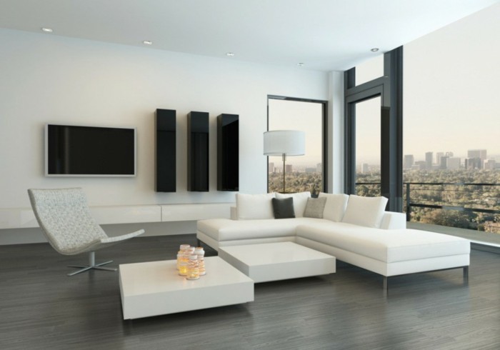 schönes wohnzimmer weiße möbel schwarze wandregale grauer bodenbelag