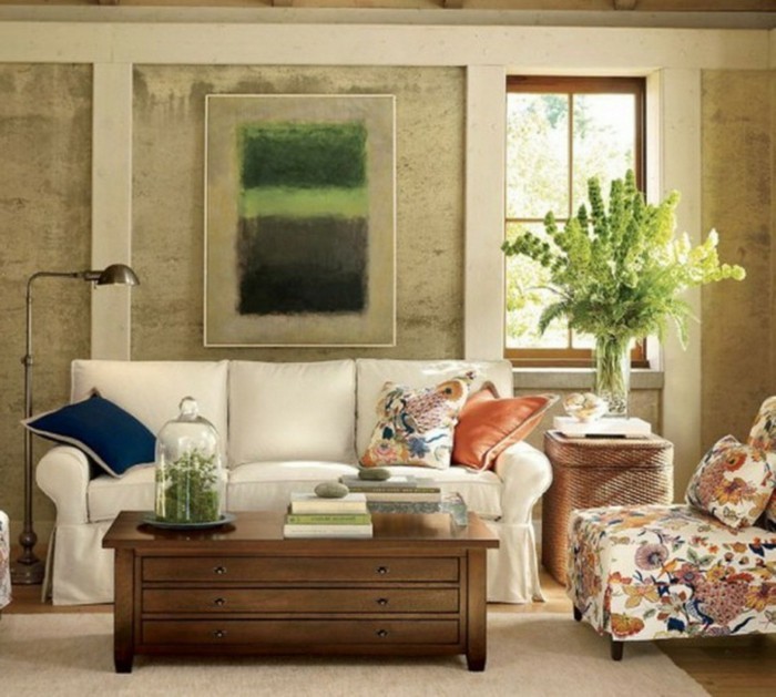 schönes wohnzimmer weißes sofa farbige stoffmuster heller teppich