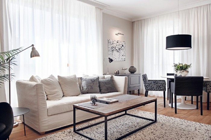 schönes wohnzimmer weißes sofa pflanzen offener wohnplan