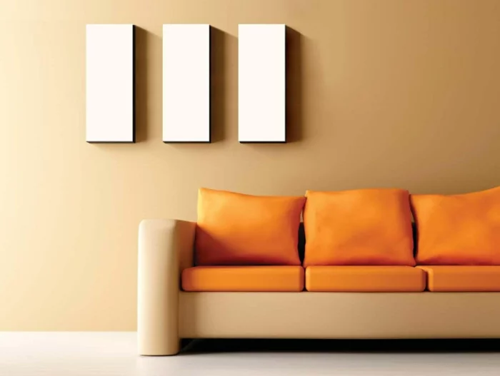 wohnideen wohnzimmer wände beige orange dekokissen
