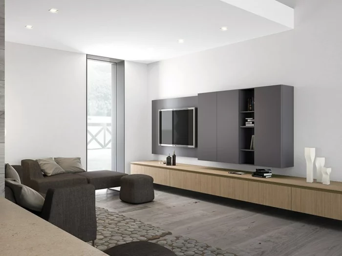 Wohnzimmer gestalten mit grauem Sofa, grauer Akzentwand und Boden in Holzoptik