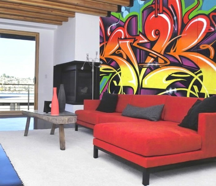dekoideen wohnzimmer graffiti rotes sofa weißer teppich