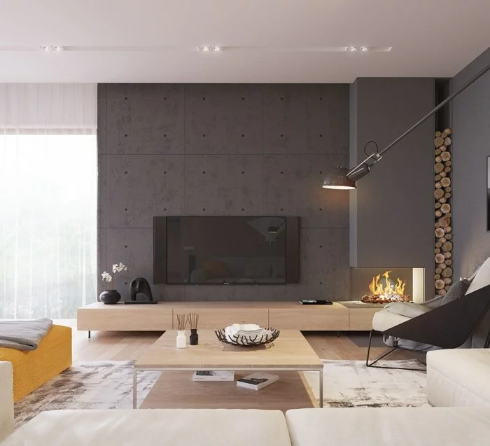 wanddesign wohnzimmer akzentwand beton dunkel feuerstelle