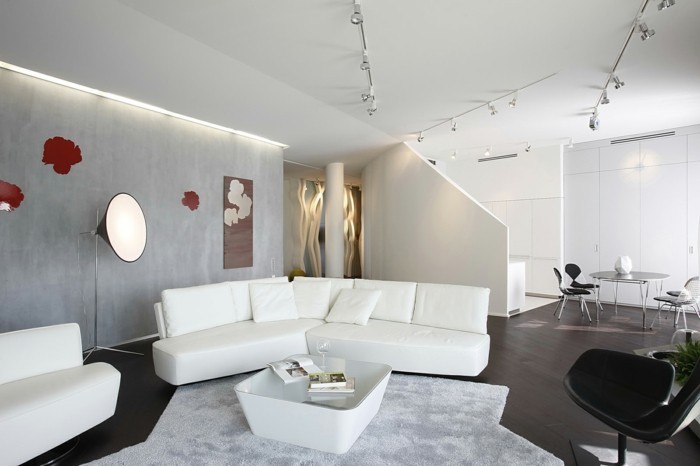 wandgestaltung ideen wohnzimmer weiße betonwände weißes sofa wanddeko