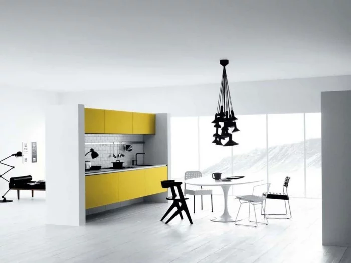 wohnideen küche minimalistisch gelbe küchenschränke weißer runder tisch