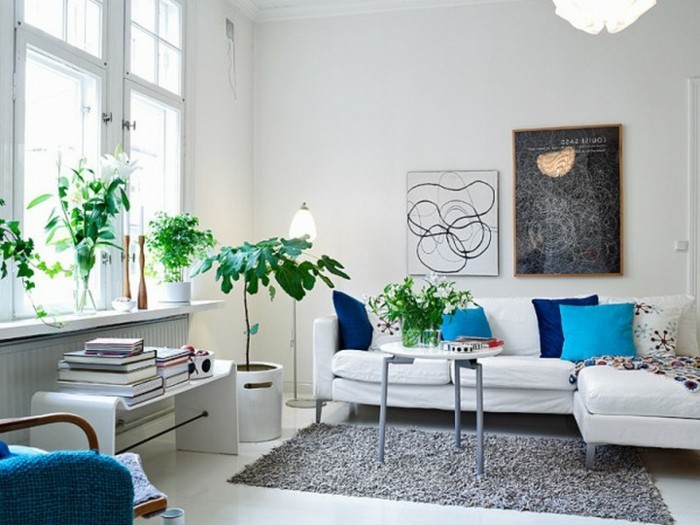 wohnung-einrichten ideen wohnzimmer umweltstil pflanzen grauer teppich weißes sofa