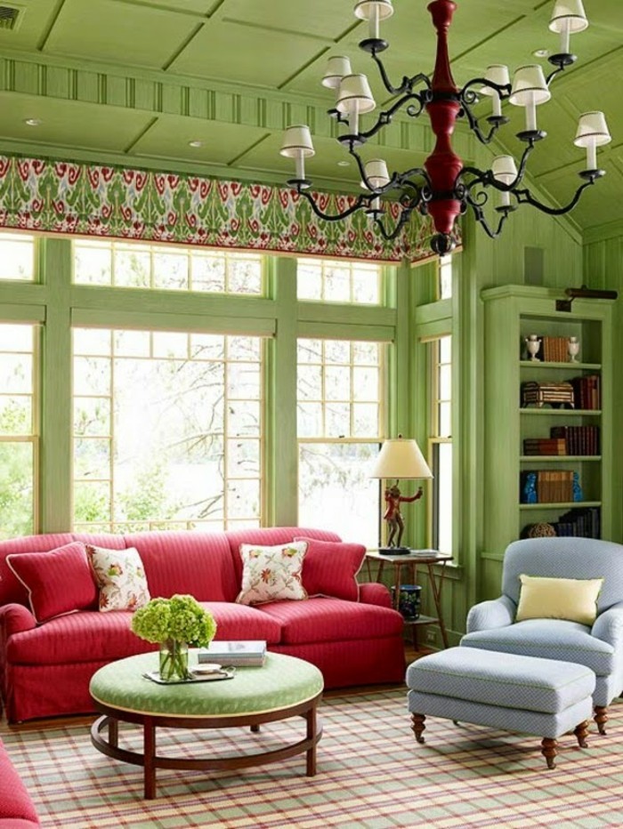 wohnzimmer gestaltung grüne wandfarbe rotes sofa