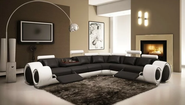 moderne sofas leder schwarz weiss hochflorteppich kamin