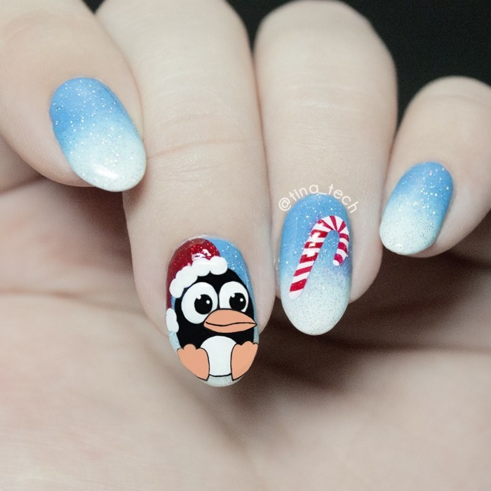 nageldesign ideen winter weihnachtliche fingernaegel pinguin