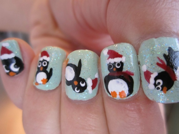 nageldesign winter weihnachtsmotive pinguinen fingernaegel ideen