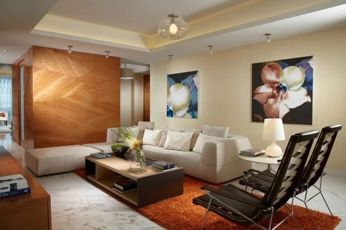 wohnideen wohnzimmer oranger teppich moderne beleuchtung abgehaengte decke