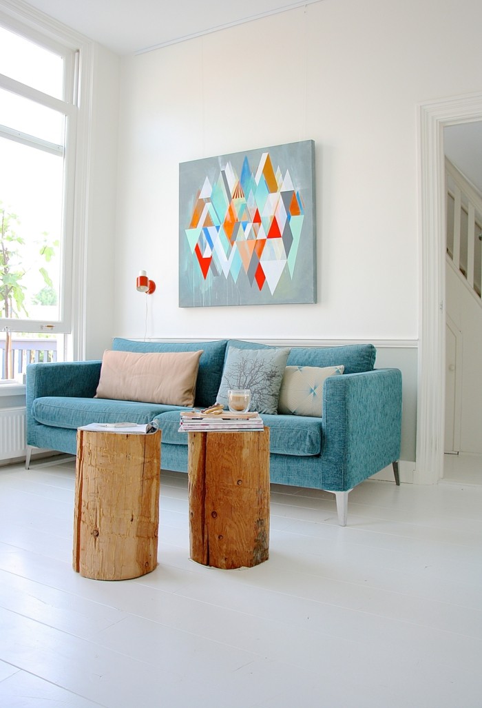 wanddesign ideen wohnideen wohnzimmer blaues sofa schöne wanddeko