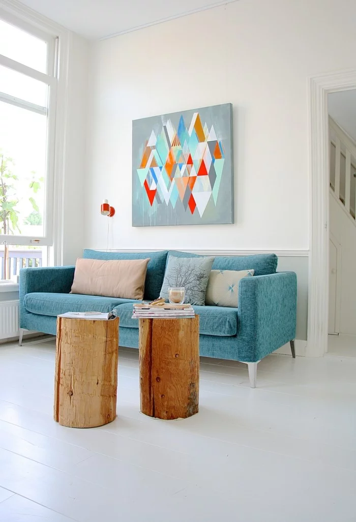wanddesign ideen wohnideen wohnzimmer blaues sofa schöne wanddeko