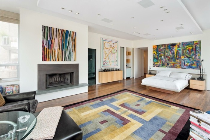 einrichtungsideen für das schlafzimmer farbiger teppich kamin bunte wandbilder