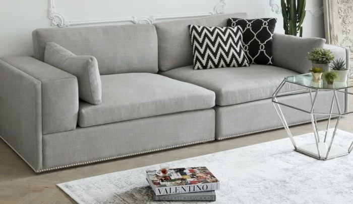graue designer couch wohnzimmer einrichtungsideen dekokissen