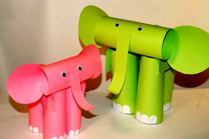 basteln mit Papier und kleine Elefanten aus Klopapierrollen und Bastelpapier machen