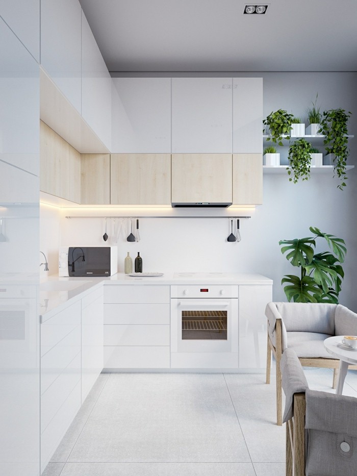 schöne wohnideen weiße küche im minimalistischen stil mit grünen pflanzen
