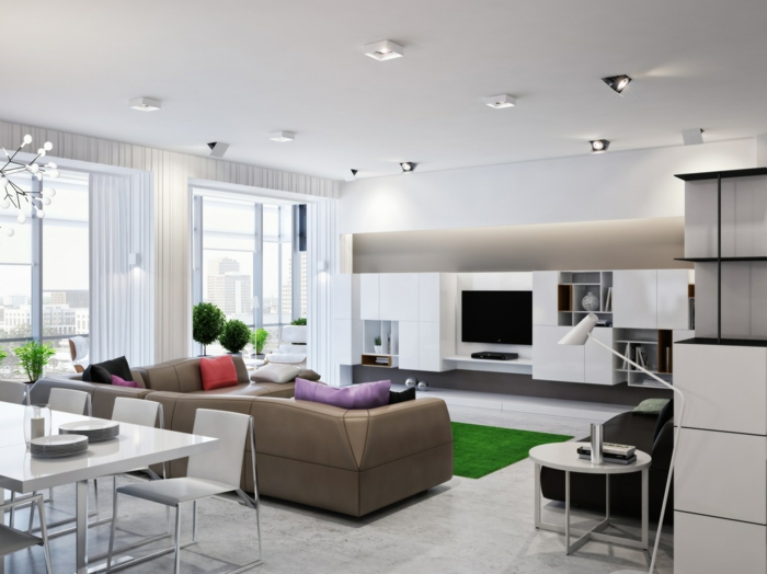 wohnküche schicker essbereich und trendiger wohnbereich mit grünem teppich