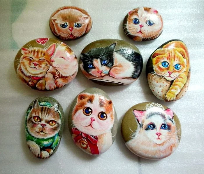 süße Katzen auf Steinen bemalt 
