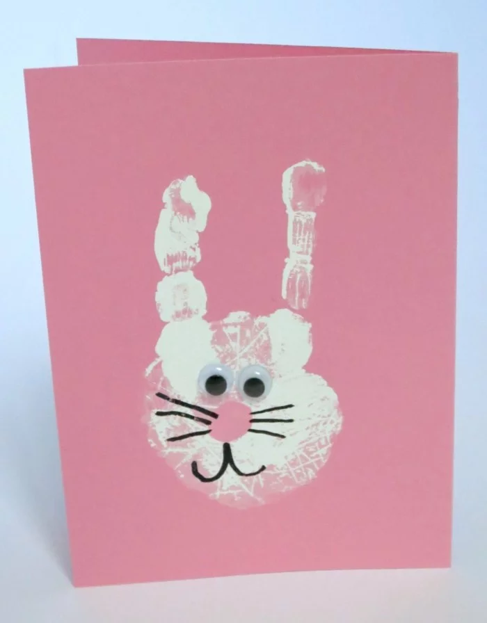 Hase aus Handabdruck für eine schöne Weihnachtskarte