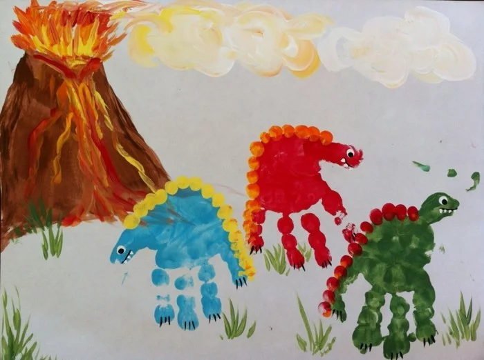 Handabdruck Bilder Dinosauren und Vulkan