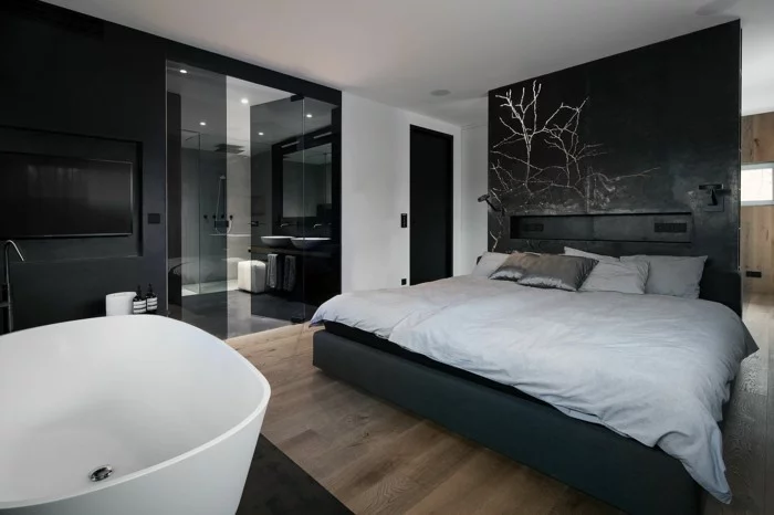 schlafzimmer einrichten freistehnde badewanne schwarze akzentwand