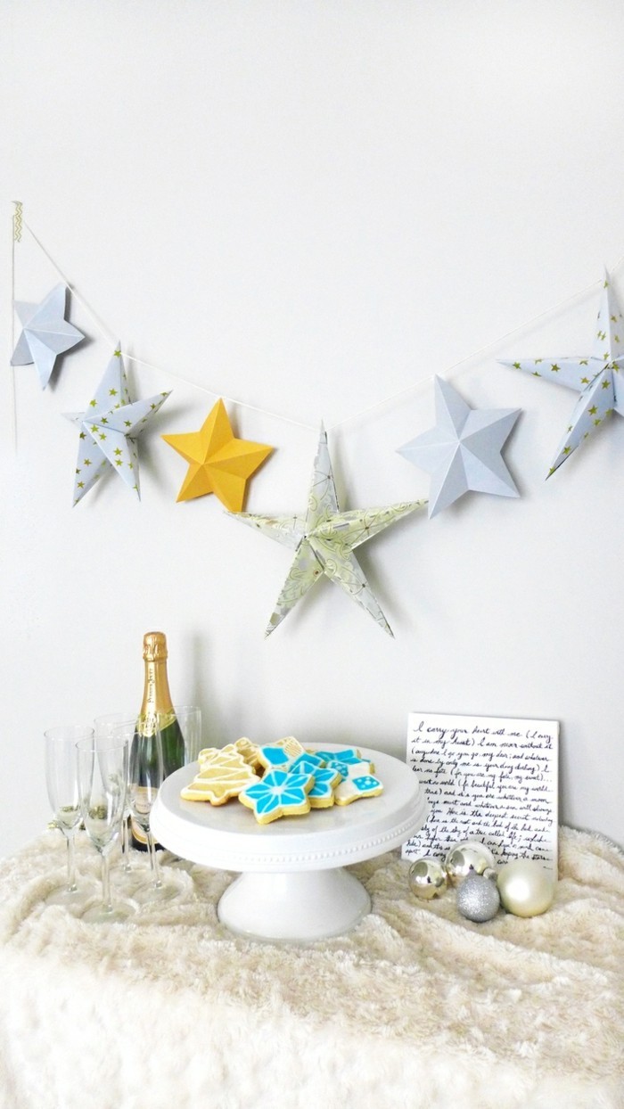 Sterne basteln für Weihnachten mit Origami Anleitung weihnachten wanddekoration