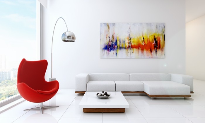 minimalistisch wohnen weiße wände roter sessel weißes ecksofa