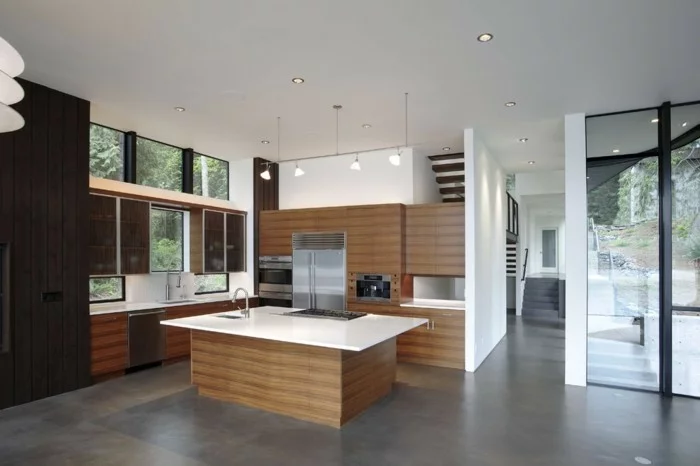 betonboden moderne küche schöne holztexturen weiße oberflächen