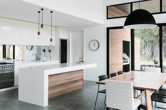 betonboden moderne kücheneinrichtung weiße wände