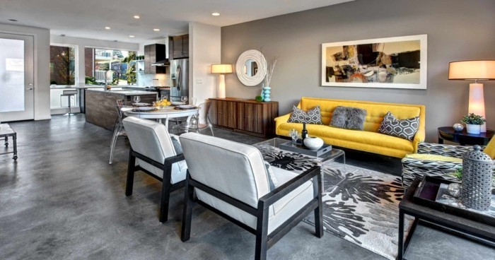 betonboden schöner bodenbelag wohnzimmer gelbes sofa