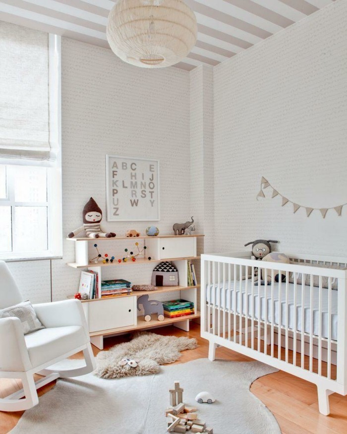 babyzimmer ideen teppich schaukelstuhl weißes gitterbett