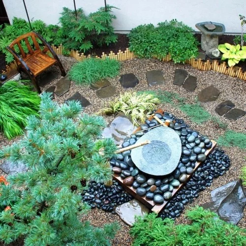 Gartenideen Gartengestaltung Feng Shui runde Steine das weibliche Yin