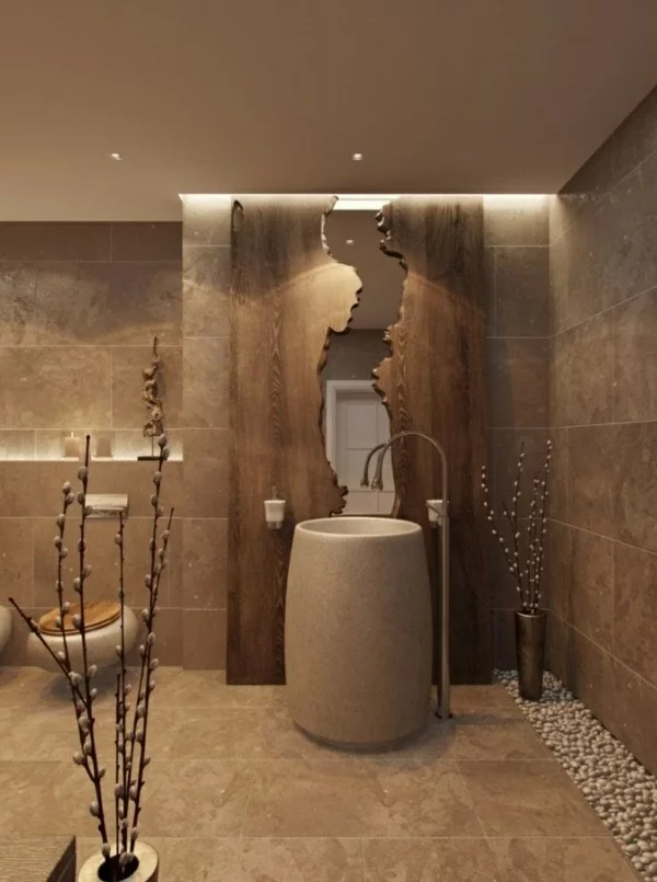 modernes Badezimmer in Braun mit einem rustikalen Wandspiegel und frischer Deko in Vasen