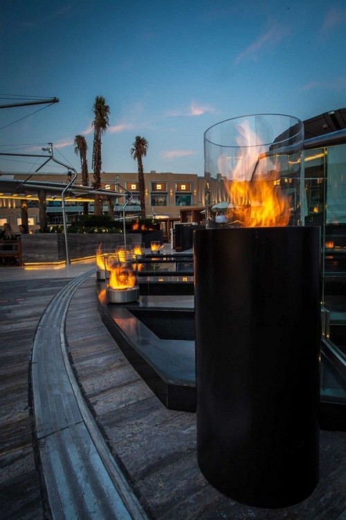 Moderner Terrassenkamin sorgt für angenehme Stunden auf der eigenen
