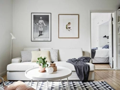 wohnzimmer einrichten ideen geometrischer teppich dreiecke skandinavischer stil
