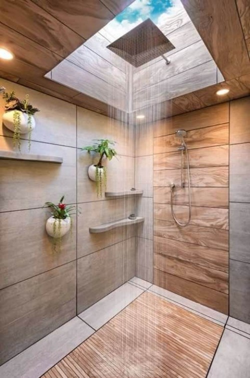 Holz im Bad sehr trendy Fliesen regendusche grüne Pflanzen an der Wand