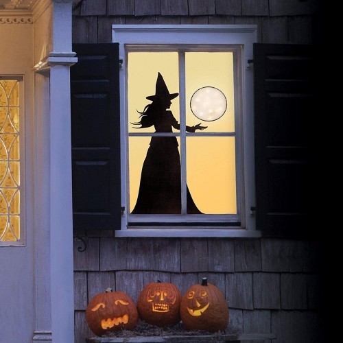 Halloween Fensterdeko Schattenbild Hexe drei geschnitzte Kürbisse draußen