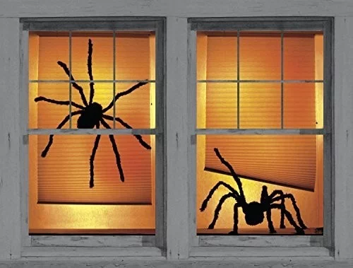 Halloween Fensterdeko zwei große schwarze Spinnen orangenfarbenem Hintergrund gut Beleuchtet