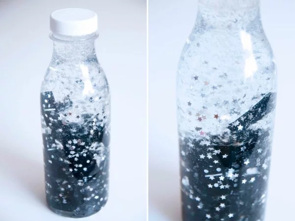 Sensorik Flaschen selber machen Materialien Dominoteile für die Füllung 