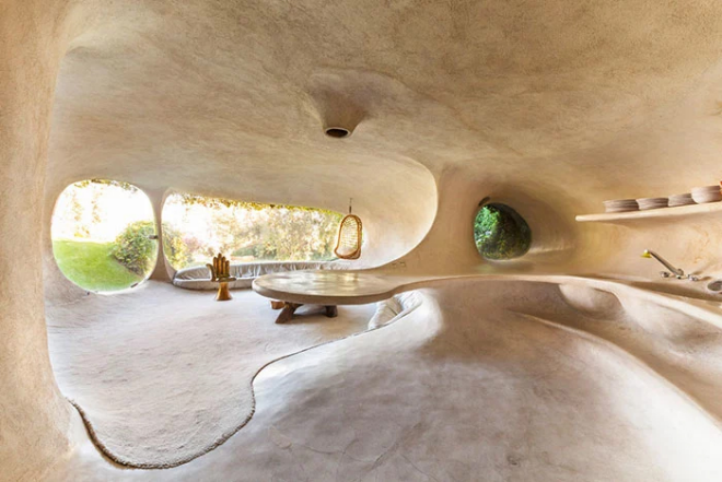 Hobbit House organische Architektur runde Formen gewölbte Decken im Inneren