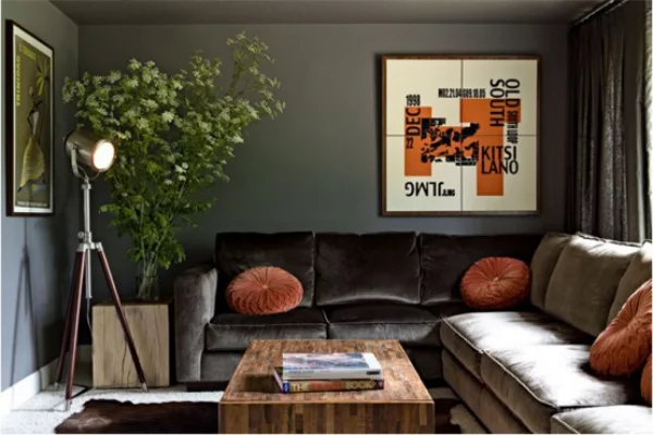 Maskulin und elegant modernes Wohnzimmer grau beige runde Deko Kissen in Pfirsichfarbe
