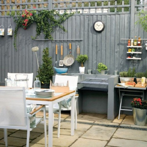 Outdoor Küche einfaches Design Arbeitsplatten aus Beton Holzlatten Sichtschutz