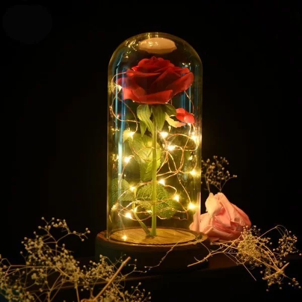Rose im Glas ideen mit kleiner Lichterkette dekoriert toller Blickfang