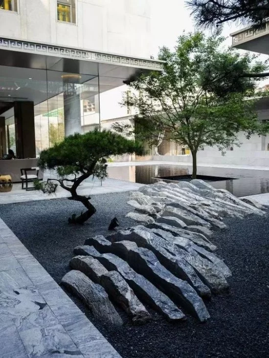Japanischer Garten hohe Ästhetik visuelle Harmonie Steine Kiesel typische Stilelemente