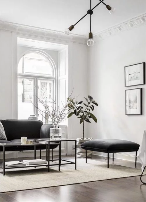 Wohnzimmer in Schwarz-Weiß minimalistischer Stil perfekte Einrichtung stilvolle Raumgestaltung 