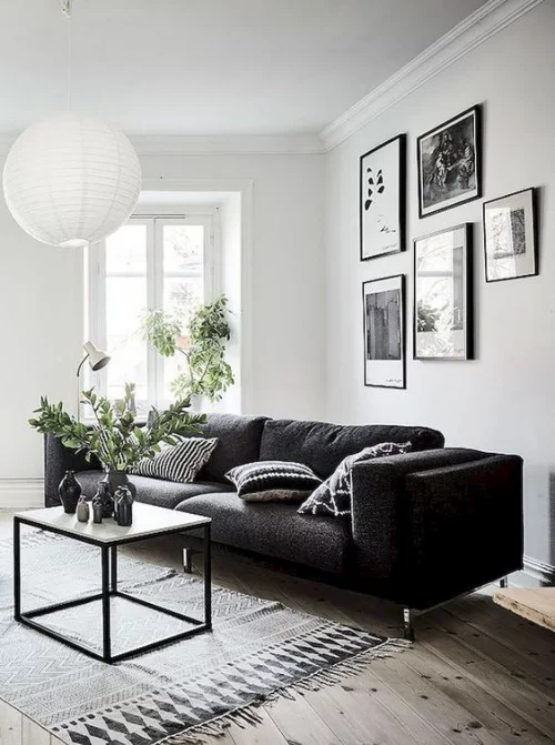 Wohnzimmer in Schwarz-Weiß schicke Raumgestaltung wenige Möbel